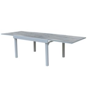 Table Modulo 6/10 personnes structure aluminium blanche, plateau en verre décors bois