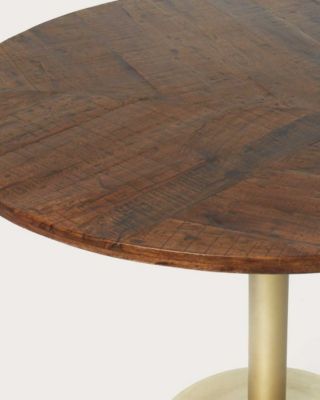 Table repas ronde en bois massif et pied tulipe doré D110 cm 6 pers - Uniqka