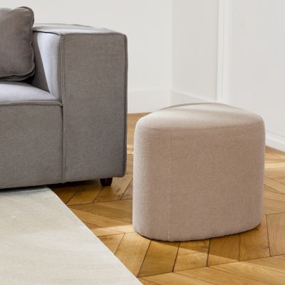 tabouret. pouf en forme de galet en tissu taupe. TAO L 60 x P 44 x H 40cm