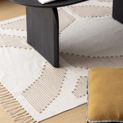 Tapis décoratif Blanc Ivoire et Beige lin motif en relief brodé 120 x 170 cm