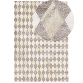 Tapis en cuir beige et marron 140 x 200 cm SESLICE