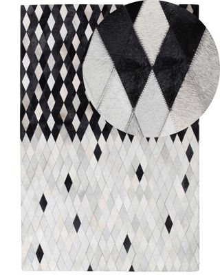 Tapis en cuir blanc et noir 140 x 200 cm MALDAN