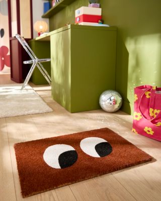Tapis en fibres de coco Taxi Brousse x Castorama motifs yeux 40 x 60 cm