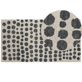 Tapis en laine 80 x 150 cm beige et noir HAVRAN