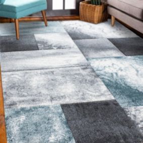 tapis grand salon 200x290 tissé bleu et gris clair motif géométrique