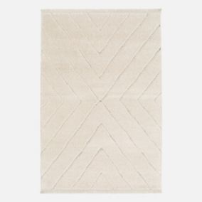Tapis intérieur tufté avec légers reliefs crème. 80 x 150cm