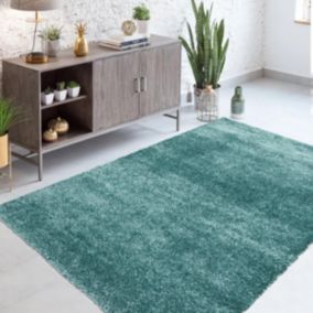 Tapis longs poils shaggy 140x200 rectangle tissé bleu et turquoise motif uni