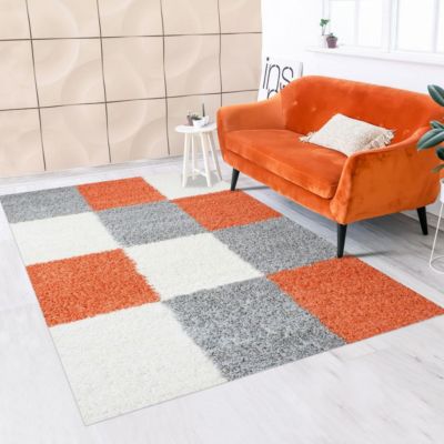 Tapis poils longs shaggy 120x170 rectangle tissé orange et gris motif damier