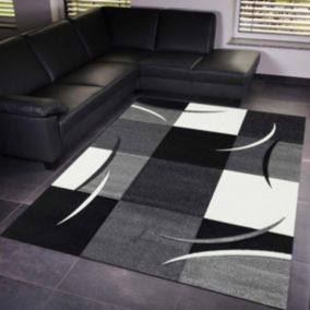 tapis salle à manger 200x290 tissé gris rectangle motif damier COMMA