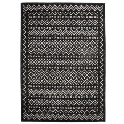 Tapis toucher laineux imprimé motifs ethniques noir 133x190
