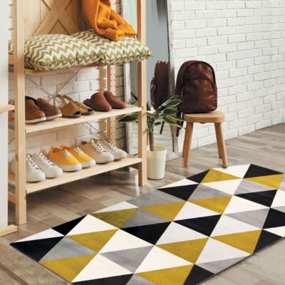 Tapis toucher laineux motif triangles jaune 80x150