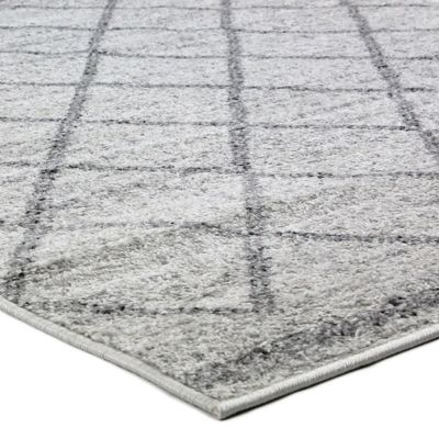 Tapis toucher laineux motifs ethniques écru 133x190