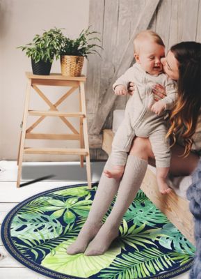 Tapis vinyl rond pour le salon Tulup fi50 cm Imperméable lavable Feuilles tropicales