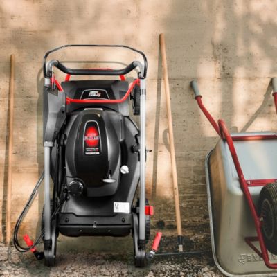 Tondeuse thermique tractée 202CC avec moteur Honda, mulching, éjection latérale et vitesse variable.