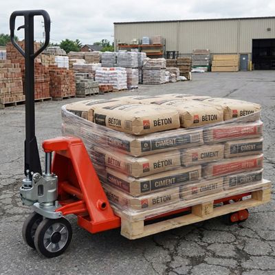 Transpalette roues directrices caoutchouc, boggies polyuréthane - Haute résistance - Fourches 1150x540mm - Charge max 2500kg -