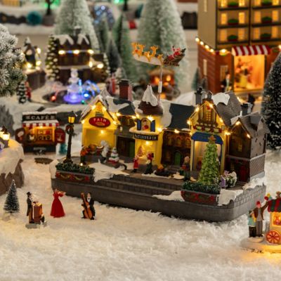 Village lumineux centre ville avec rennes musical 24 led - feeric lights & christmas