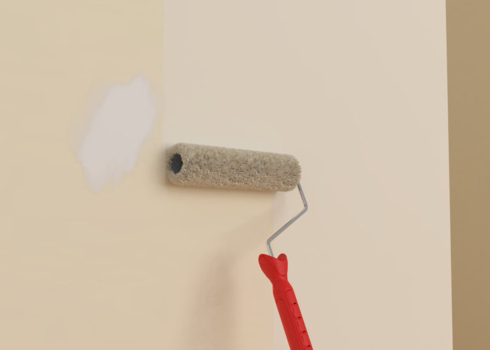 Rouleau de peinture qui repeint le mur.