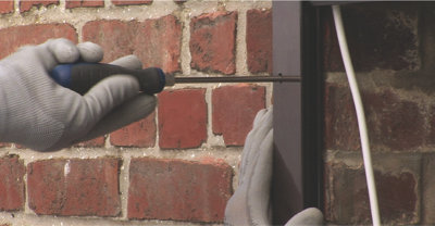 Installer un volet roulant à sangle