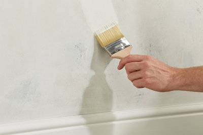 Passage d'une sous-couche avec un pinceau