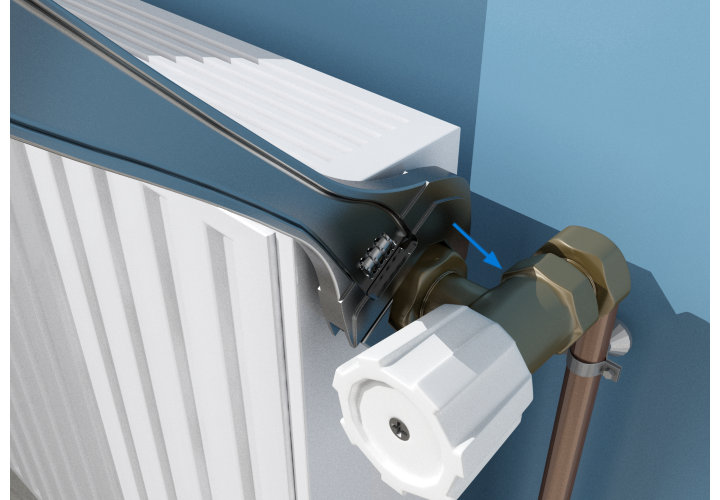 Desserrez, côté radiateur, les écrous de liaison du radiateur à l’aide d’une clé à molette