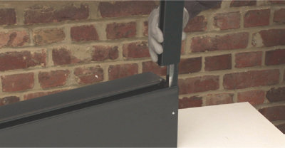 Installer un volet roulant électrique sous linteau