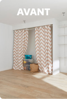 Pièce vide avec dressing à rideaux