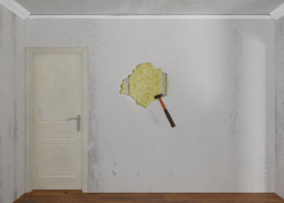 Massette abattant le mur