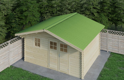 Cabanon en bois avec toit vert ondulé