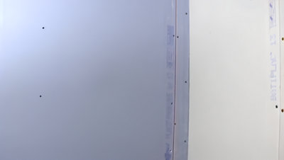 Plaques de platre posées au mur