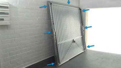 Fixer la porte de garage basculante