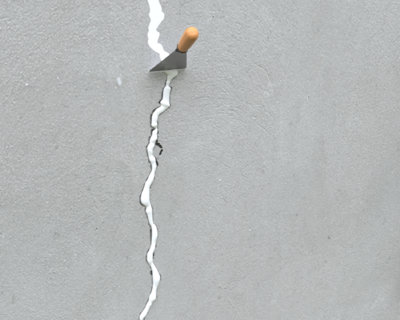 Au couteau américain, lissage de l'enduit