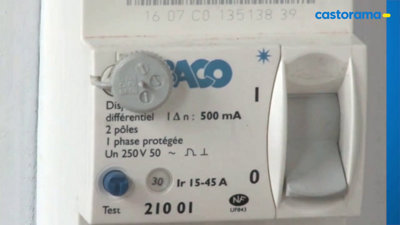 Disjoncteur différentiel Baco 500mA avec son plombage de sécurité Castorama.