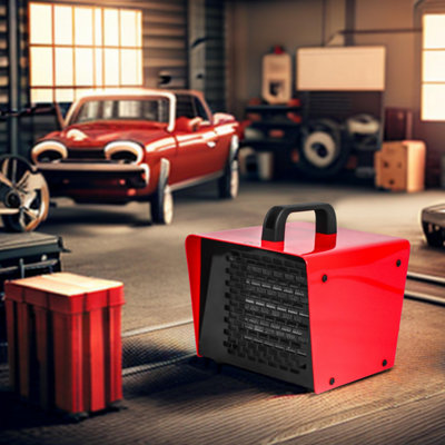 Chauffage de chantier céramique rouge dans un garage