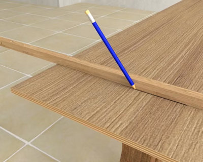 Traçage des découpes des panneaux avec une règle de maçon