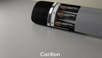 Carillon ouvert avec pile à l'intérieur + flèches sur carillon et sonnette volume