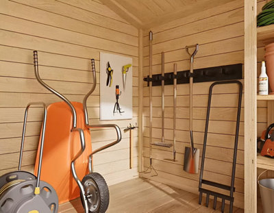 Un abri de jardin transformé en lieu de stockage des outils de jardin
