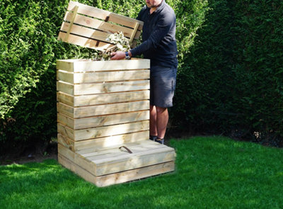 Un composteur dans un jardin