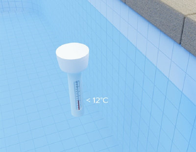 Thermomètre de piscine blanc plongé dans l'eau