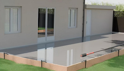 Dalle de béton en cours de pose