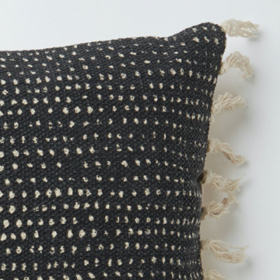 Coussin à rayures tissées
