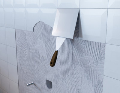 Spatule qui enlève un carreau de carrelage blanc.