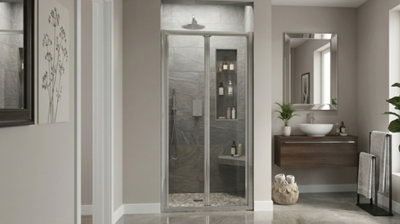 Douche dans une niche avec porte pliante