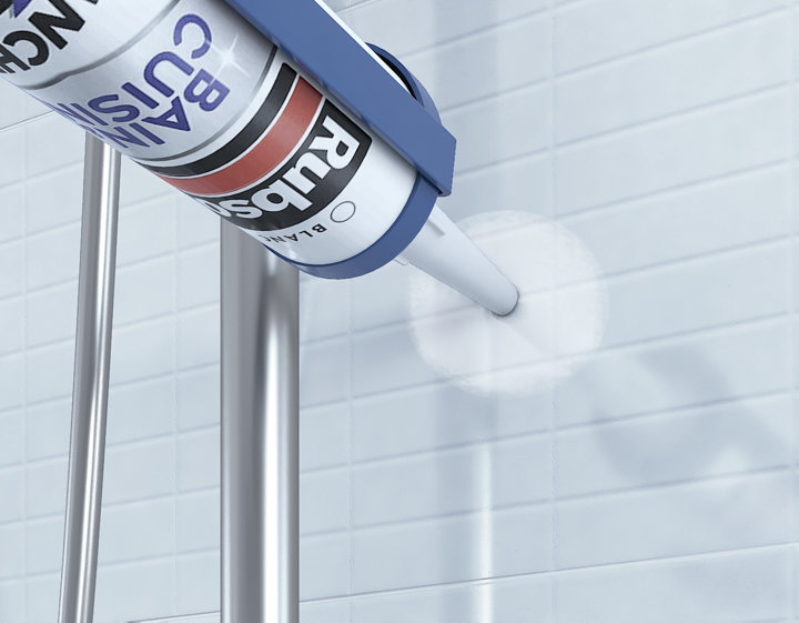 Rebouchage des trous dans le mur avec du joint sanitaire