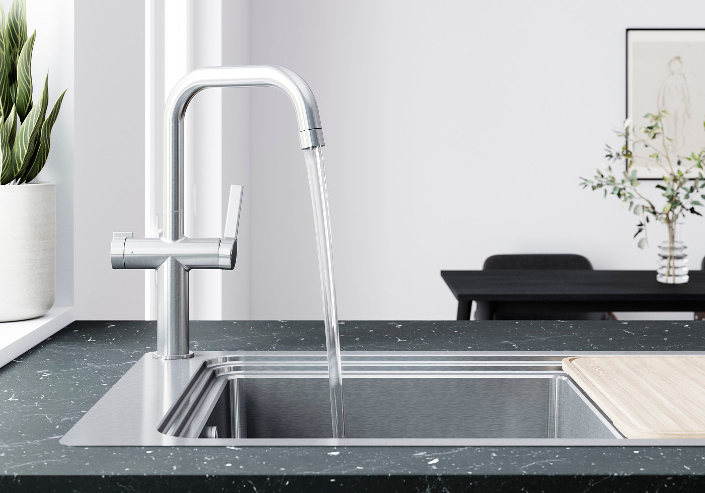 robinet cuisine haut inox avec eau qui coule dans l'évier