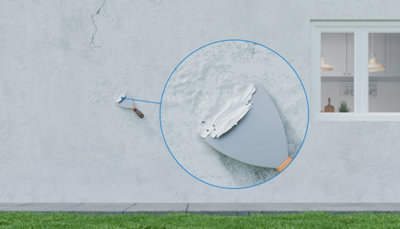 Zoom spatule sur mur avec enduit friable