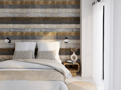Chambres avec lit, tableau et mur blanc et lambris bois coloré en bas