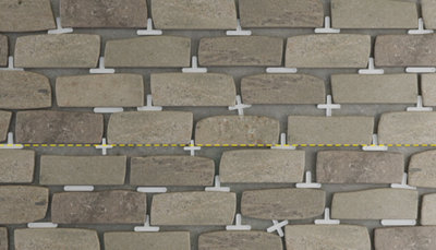 Ensemble des plaquettes de parement posées au mur avec croisillon