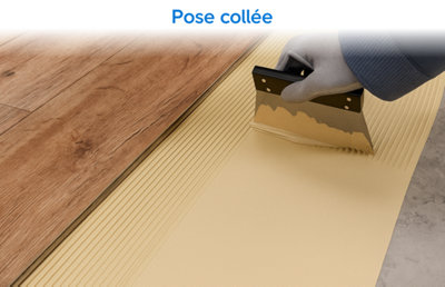 Image d'un parquet collé en cours de pose