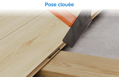 Image de parquet cloué en cours de pose