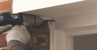 Installer un volet roulant à sangle